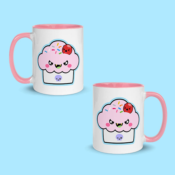 White mug with pink on the handle and interior with Cranky Cup on two sides.